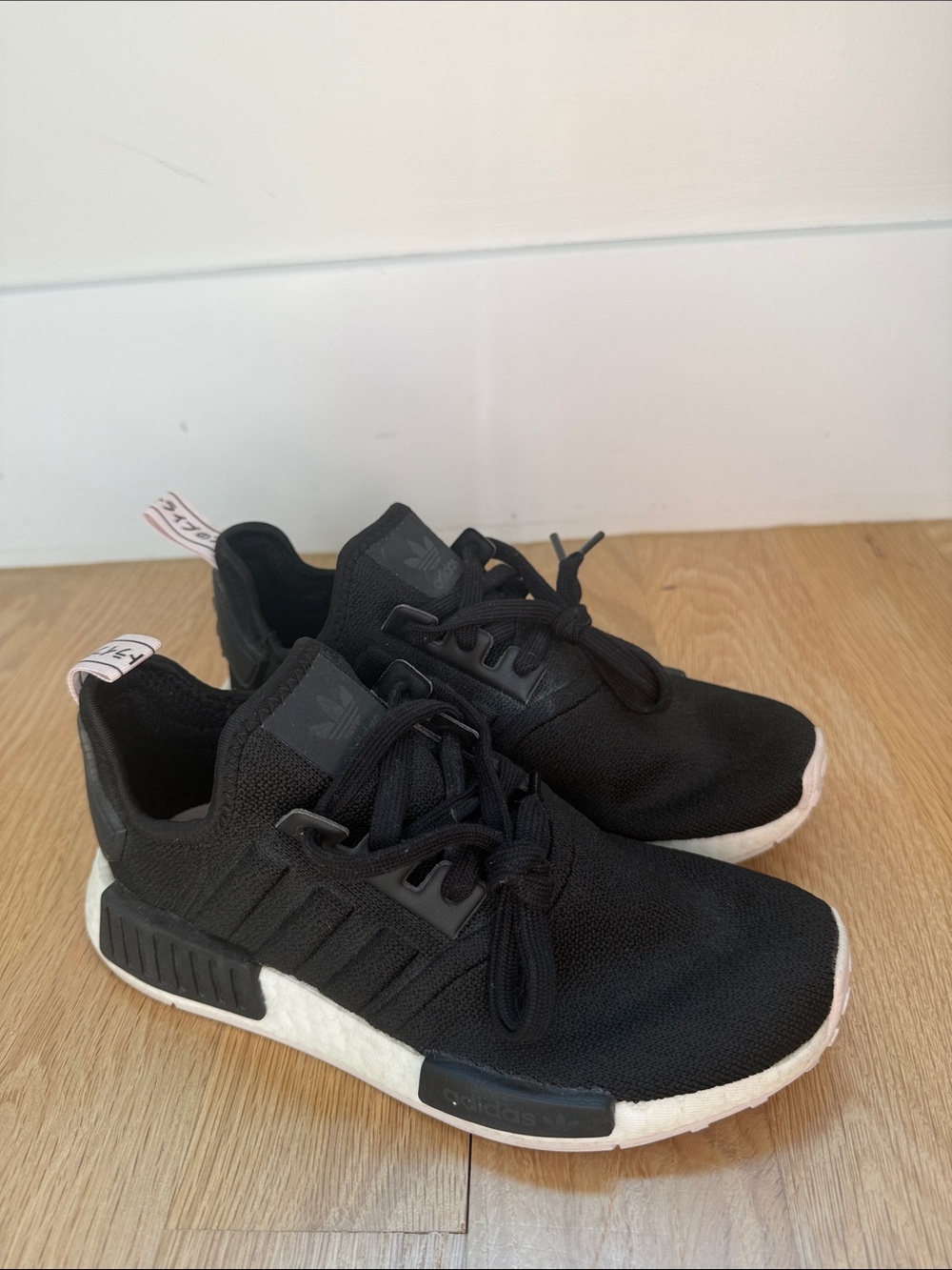 adidas Black Adidas NMD R1 sneakers with pink tag